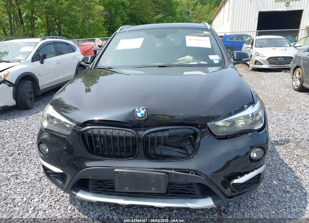 2018 BMW X1 VIN: WBXHT3C32J5L31106
