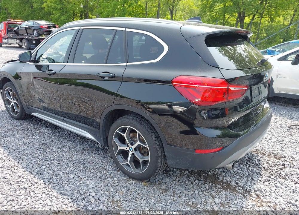 2018 BMW X1 VIN: WBXHT3C32J5L31106