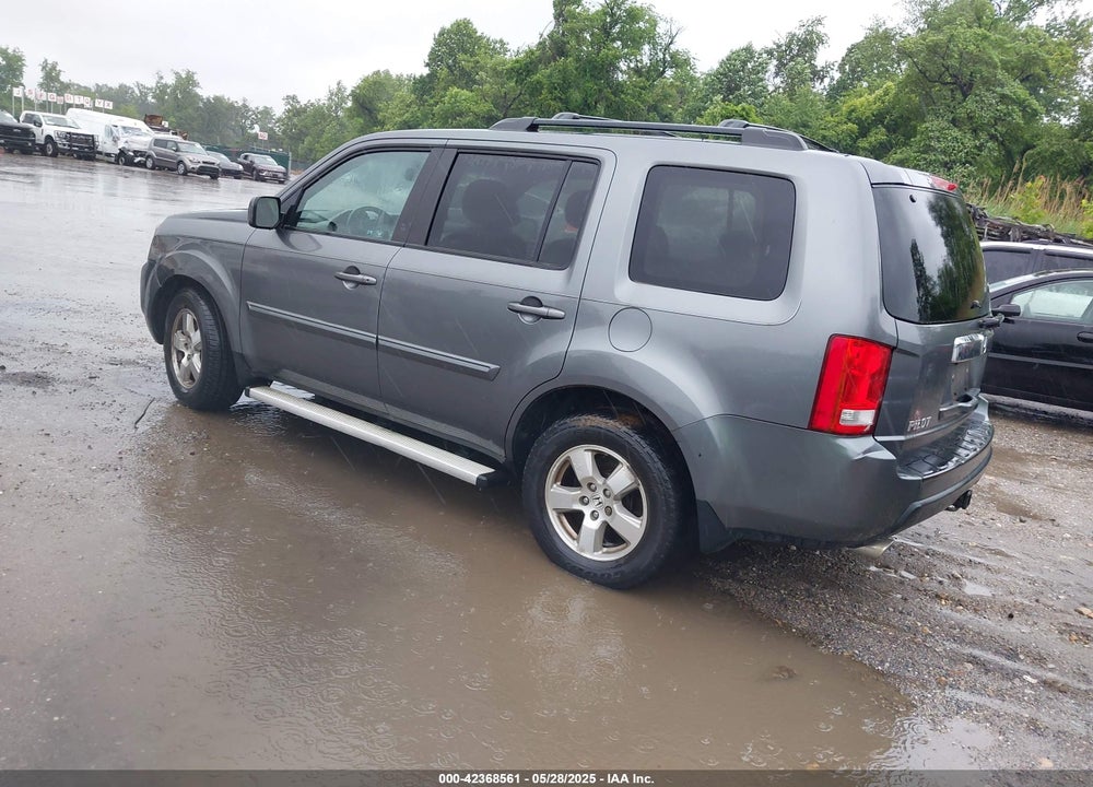 2011 HONDA PILOT EX-L VIN: 5FNYF4H51BB068563
