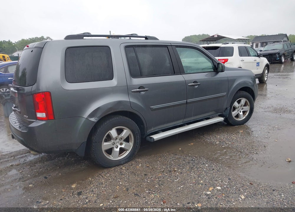 2011 HONDA PILOT EX-L VIN: 5FNYF4H51BB068563