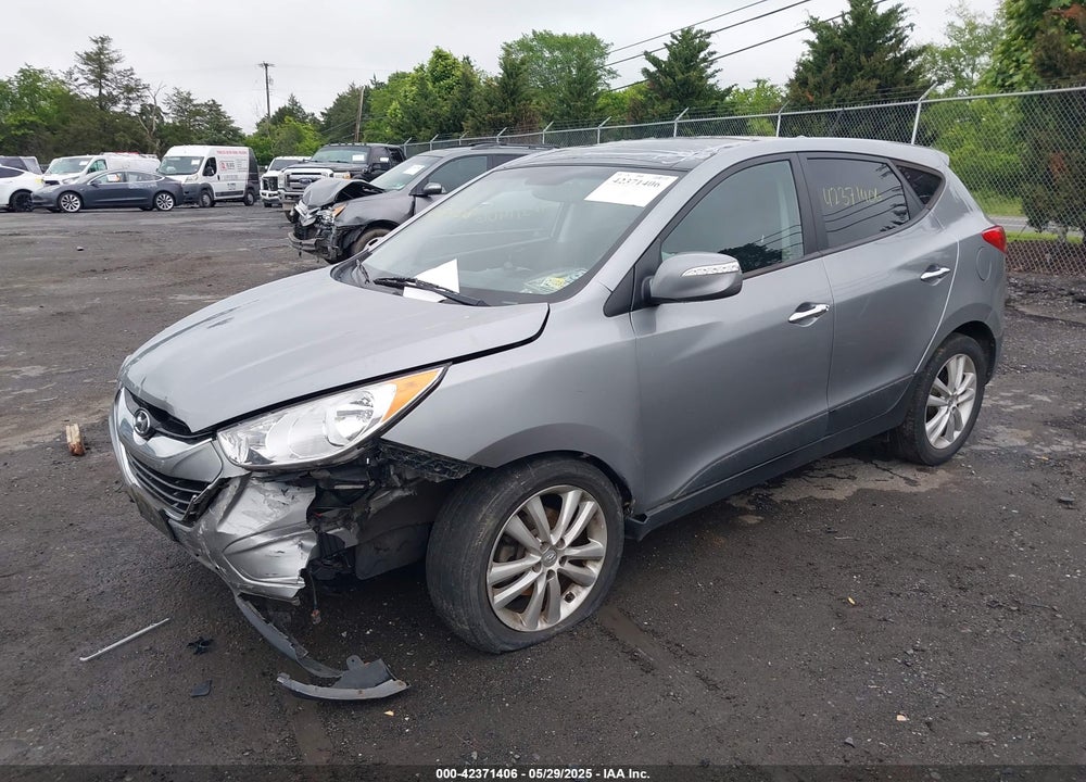 2013 HYUNDAI TUCSON LIMITED VIN: KM8JU3AC7DU675454