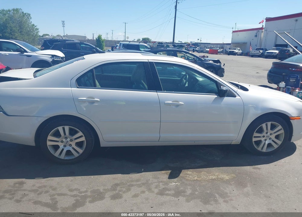 2009 FORD FUSION VIN: 3FAHP08139R185496