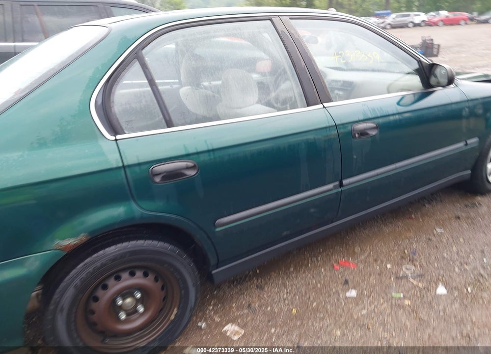 1999 HONDA CIVIC LX VIN: 1HGEJ6676XL049823