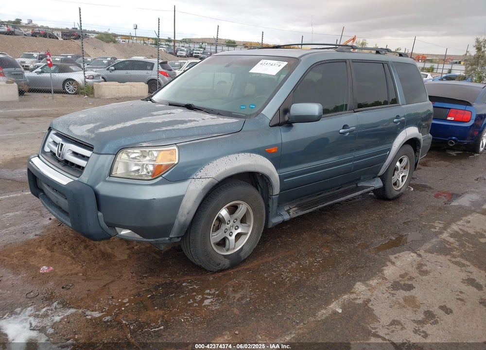 2007 HONDA PILOT EX-L VIN: 2HKYF18677H501996