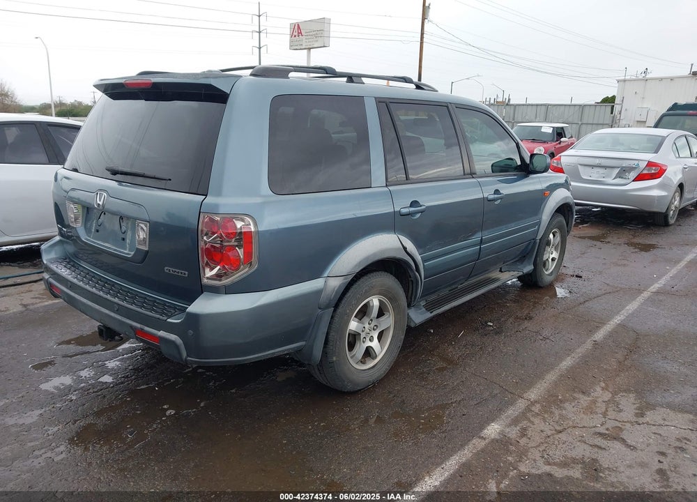 2007 HONDA PILOT EX-L VIN: 2HKYF18677H501996