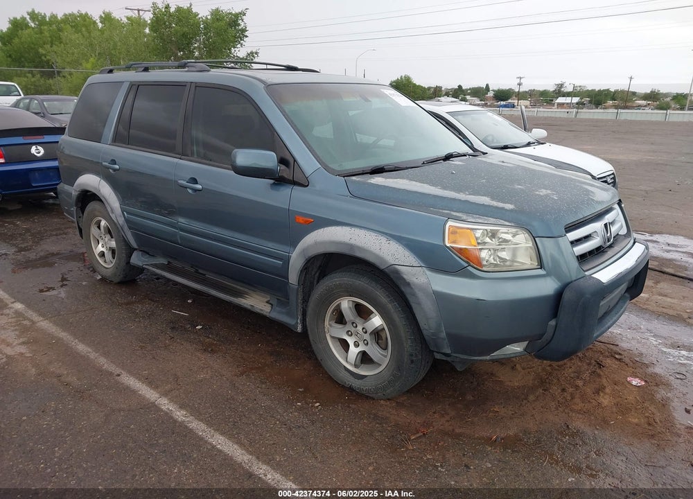 2007 HONDA PILOT EX-L VIN: 2HKYF18677H501996