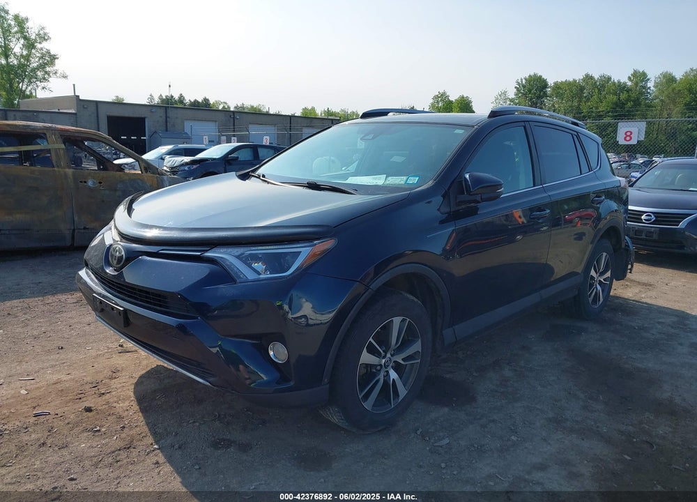 2018 TOYOTA RAV4 VIN: 2T3RFREV0JW704159