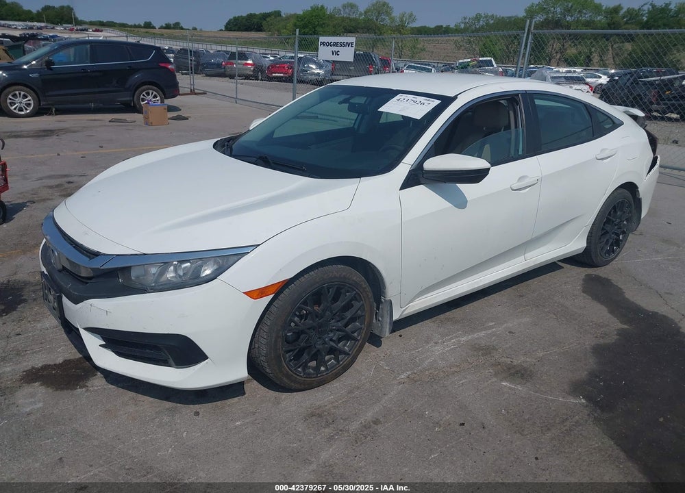 2016 HONDA CIVIC VIN: 19XFC2F59GE063244