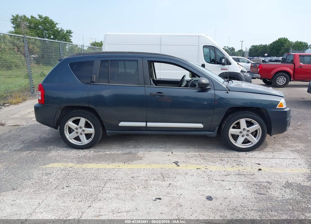 2007 JEEP COMPASS VIN: 1JBFT57W470241712
