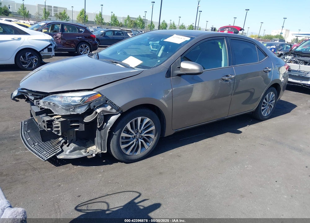 2018 TOYOTA COROLLA XLE VIN: 5YFBURHEXJP788200