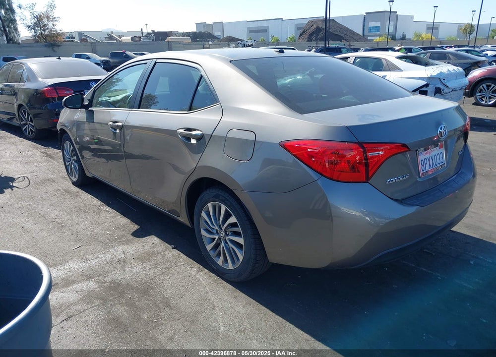 2018 TOYOTA COROLLA XLE VIN: 5YFBURHEXJP788200