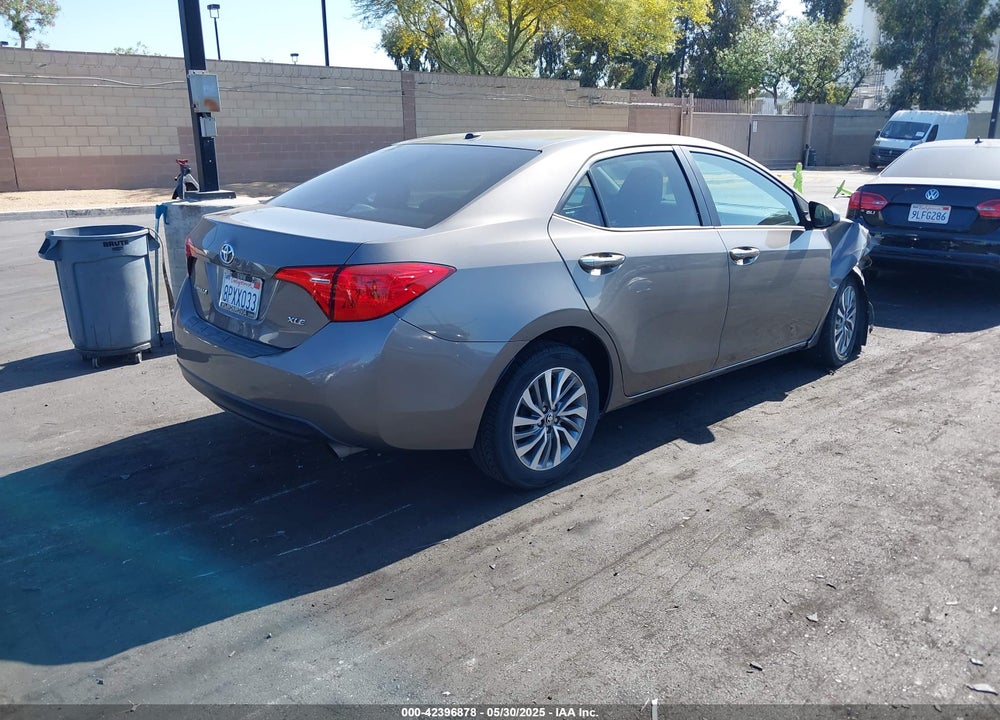 2018 TOYOTA COROLLA XLE VIN: 5YFBURHEXJP788200