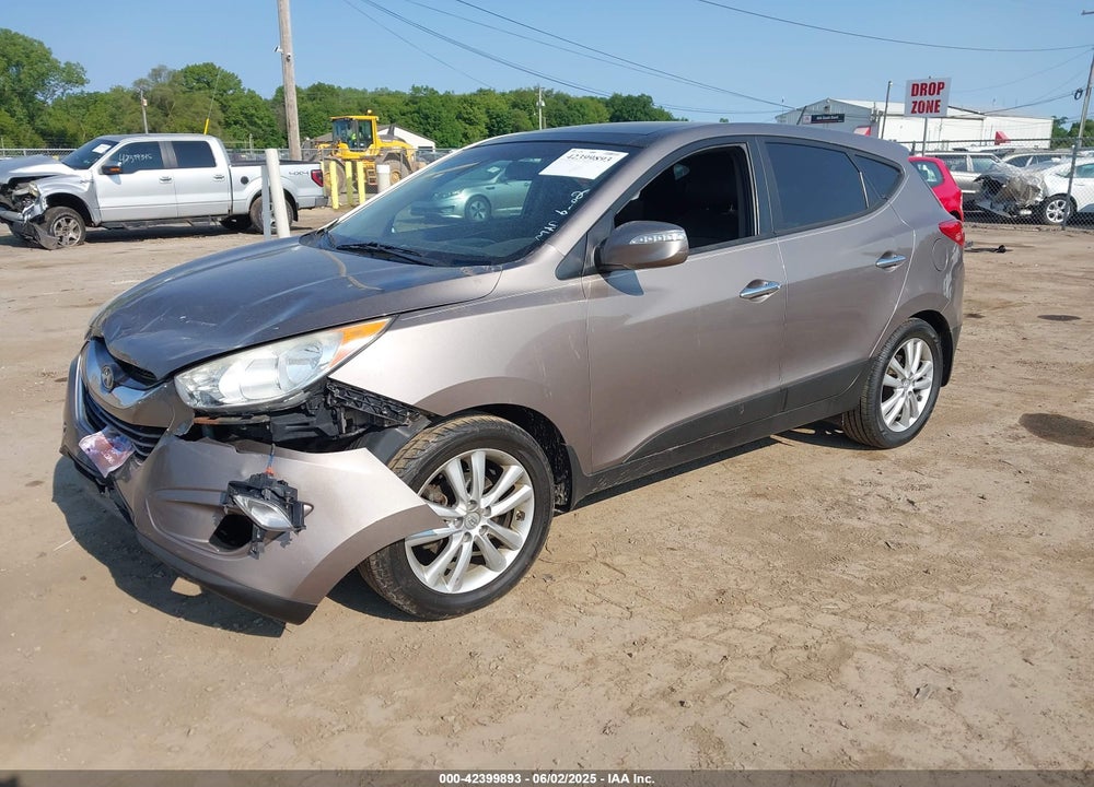 2012 HYUNDAI TUCSON VIN: KM8JU3ACXCU487302