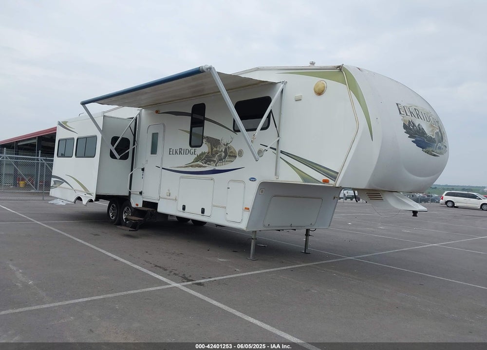 2011 HEARTLAND 34QSRL VIN: 5SFRG3728BE220520
