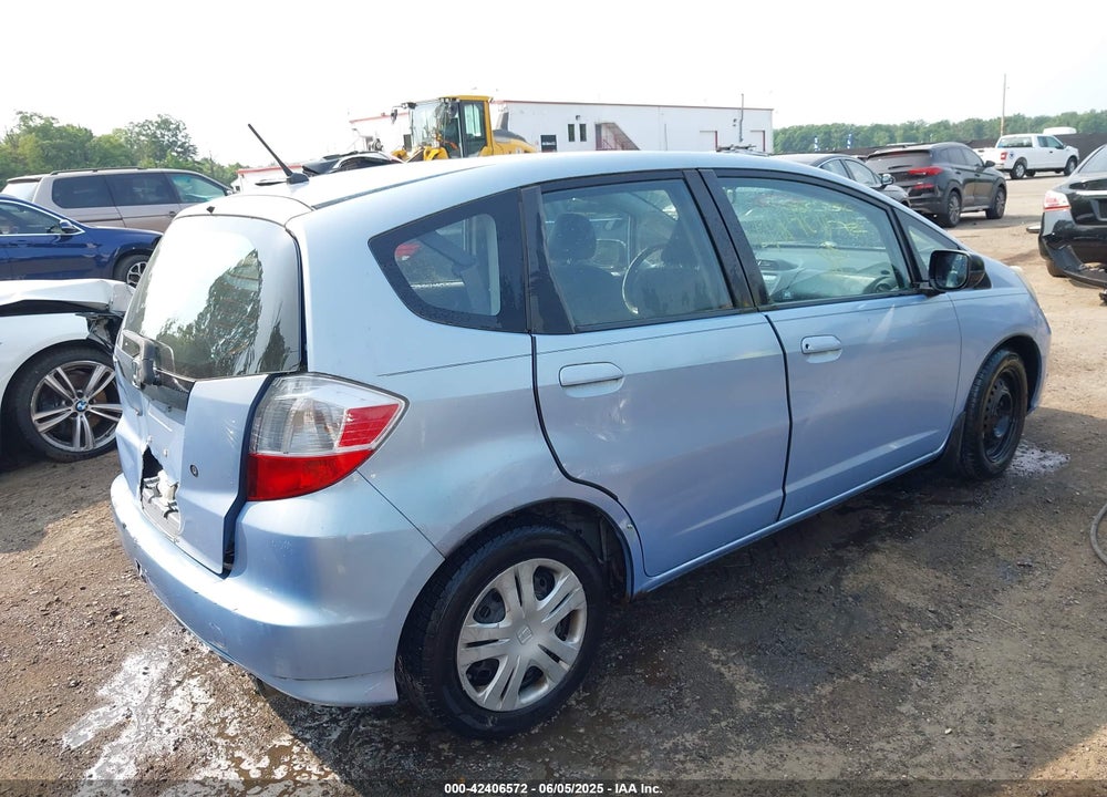 2009 HONDA FIT VIN: JHMGE88209S052443