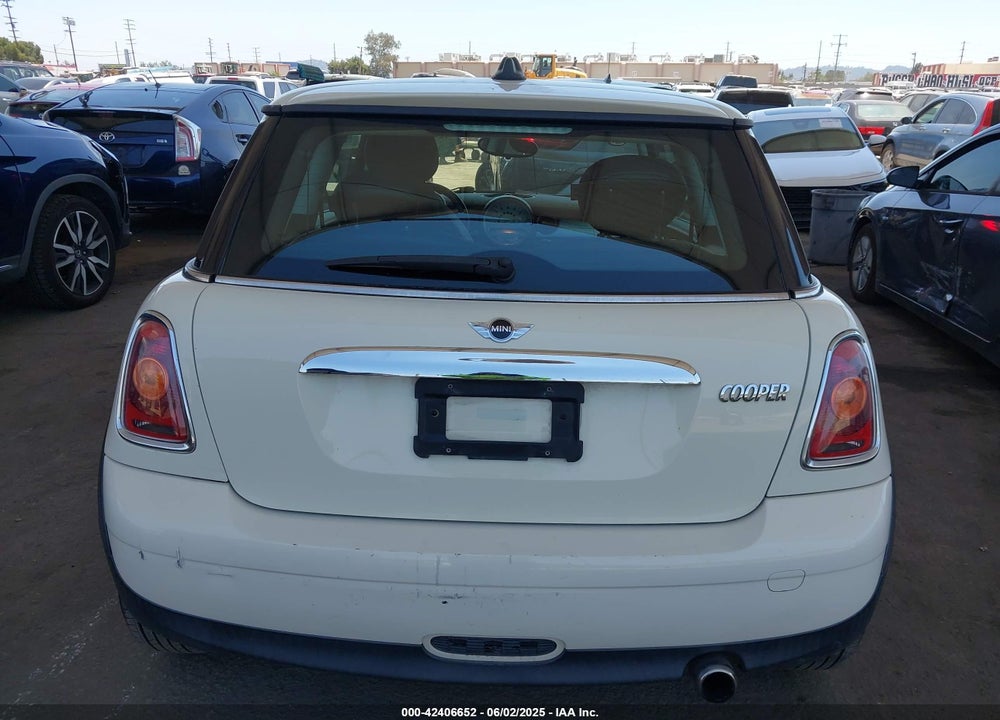 2010 MINI COOPER VIN: WMWMF3C51ATZ25361