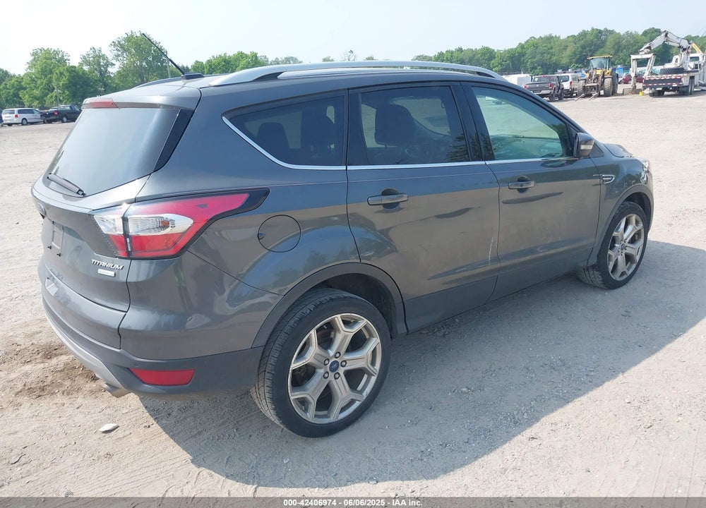 2017 FORD ESCAPE TITANIUM VIN: 1FMCU0J97HUB64604