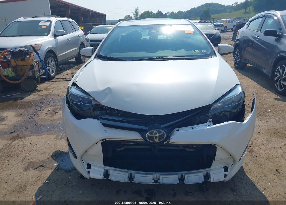 2018 TOYOTA COROLLA VIN: 5YFBURHE7JP765649
