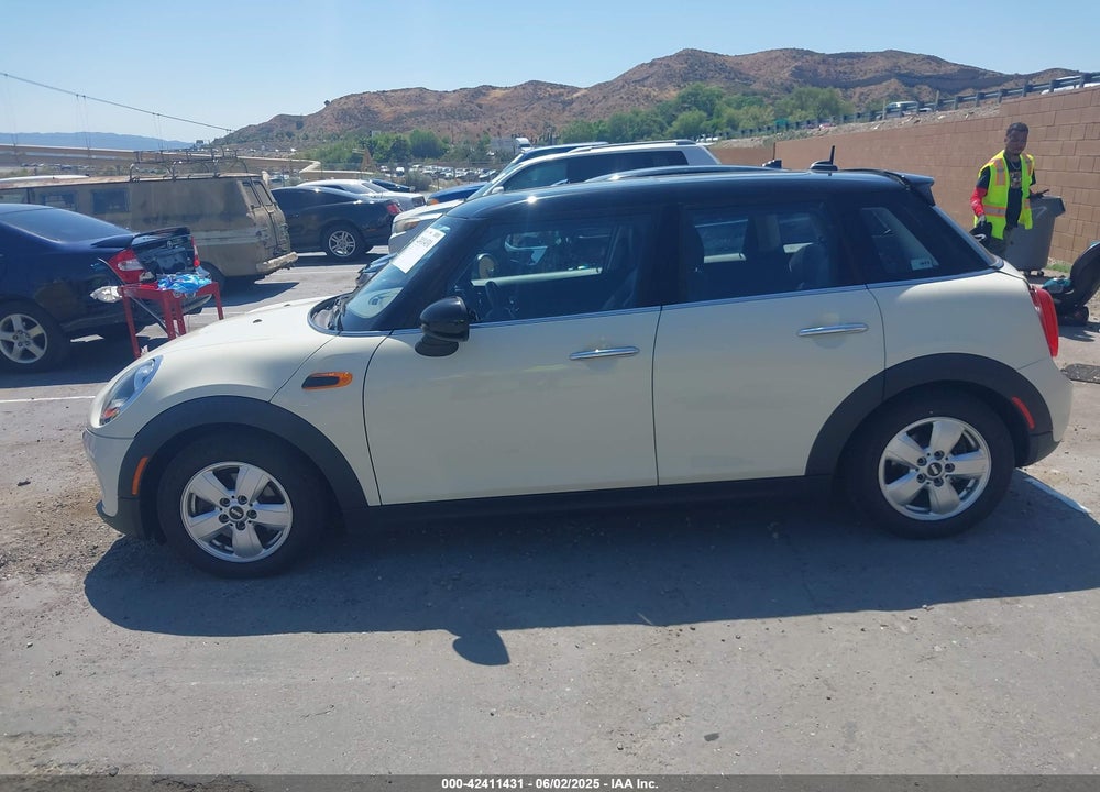2016 MINI COOPER VIN: WMWXU1C56G2D10605
