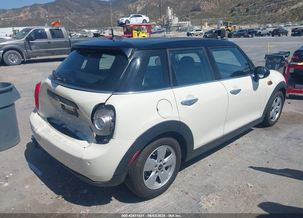 2016 MINI COOPER VIN: WMWXU1C56G2D10605
