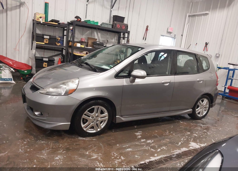 2007 HONDA FIT VIN: JHMGD37677S024047