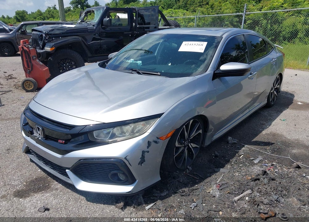 2017 HONDA CIVIC VIN: 2HGFC1E57HH701414