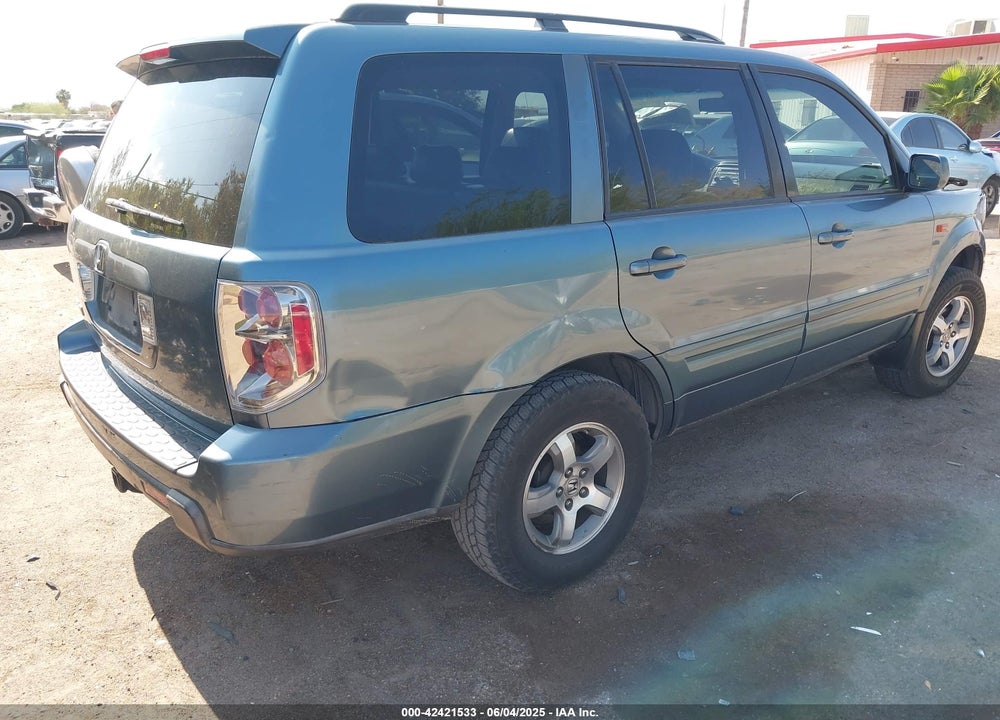 2006 HONDA PILOT EX-L VIN: 5FNYF28606B006557