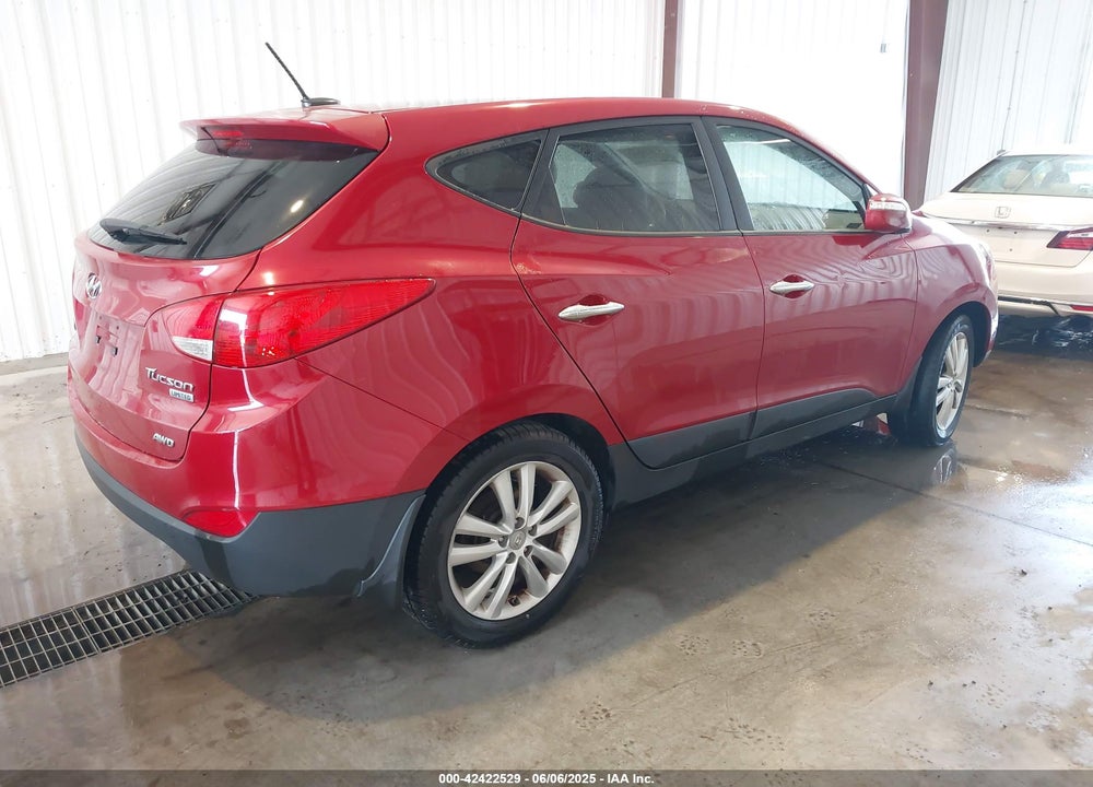 2012 HYUNDAI TUCSON LIMITED VIN: KM8JUCAC7CU542739