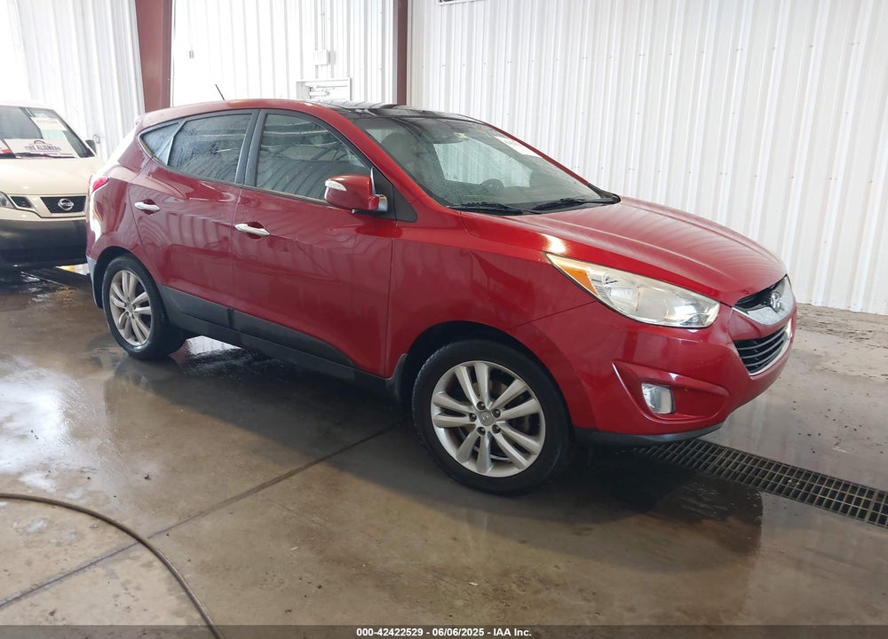 2012 HYUNDAI TUCSON LIMITED VIN: KM8JUCAC7CU542739