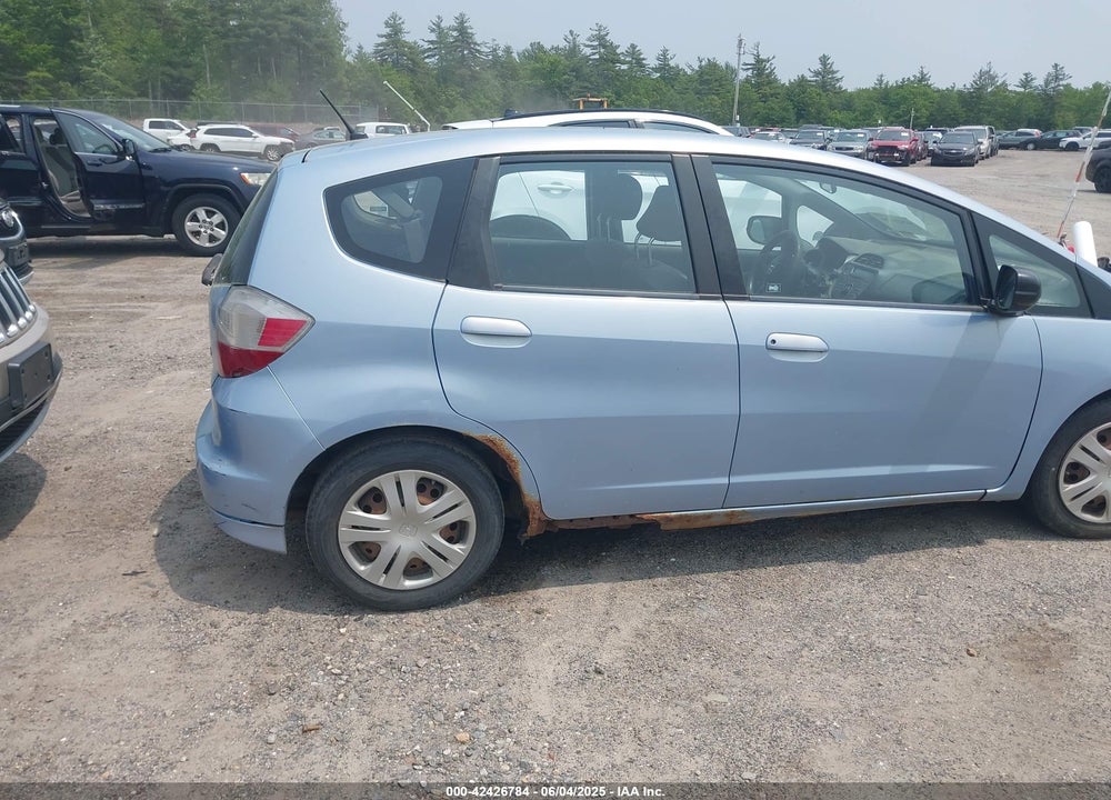 2009 HONDA FIT VIN: JHMGE88209S008443