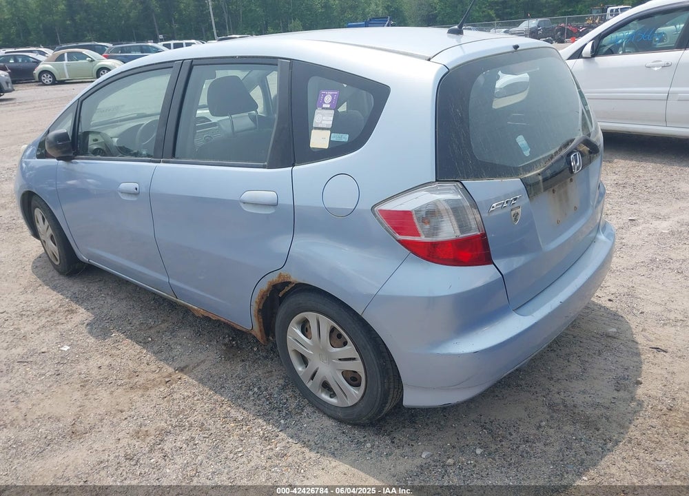2009 HONDA FIT VIN: JHMGE88209S008443