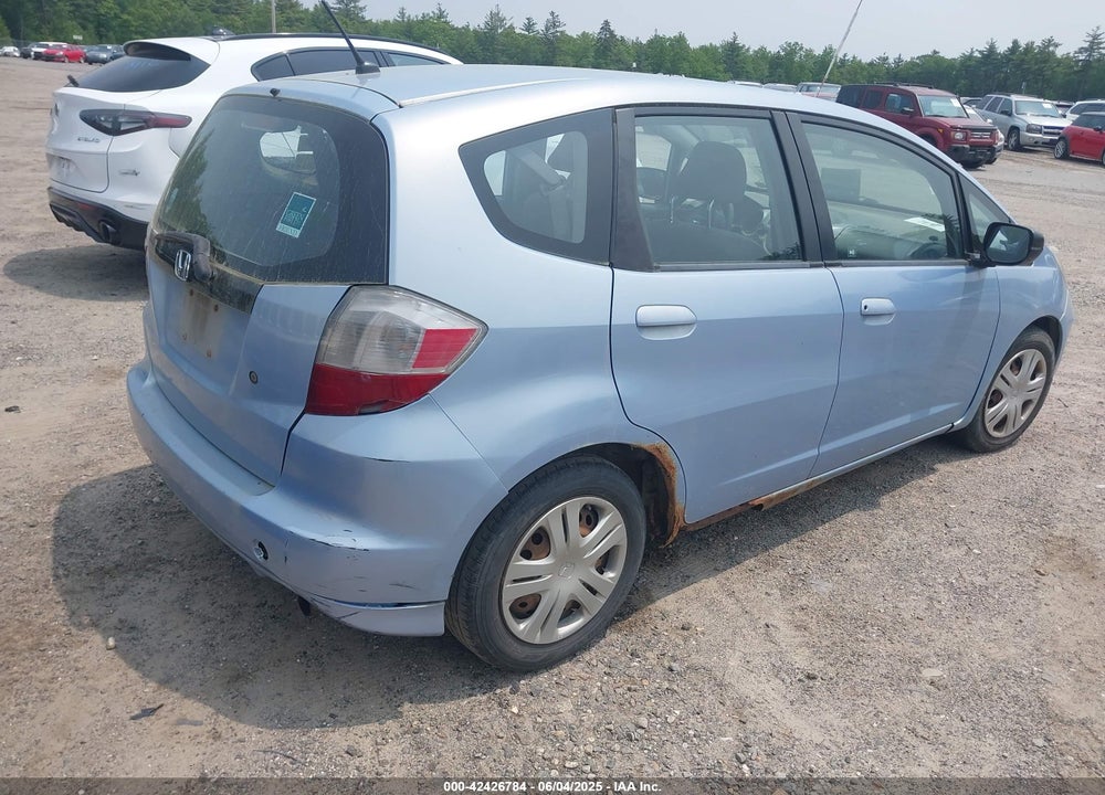 2009 HONDA FIT VIN: JHMGE88209S008443