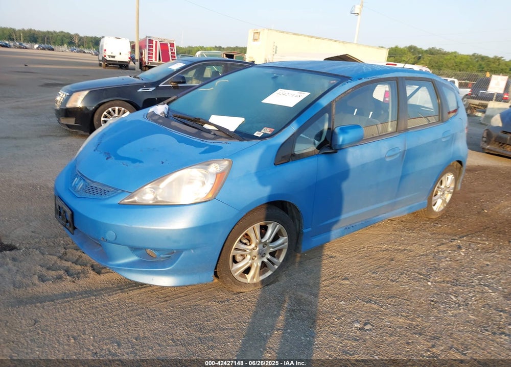 2009 HONDA FIT VIN: JHMGE88459S011761