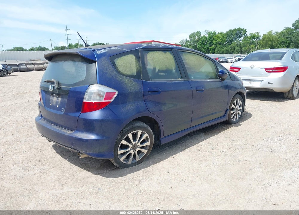 2012 HONDA FIT SPORT VIN: JHMGE8H57CC003882