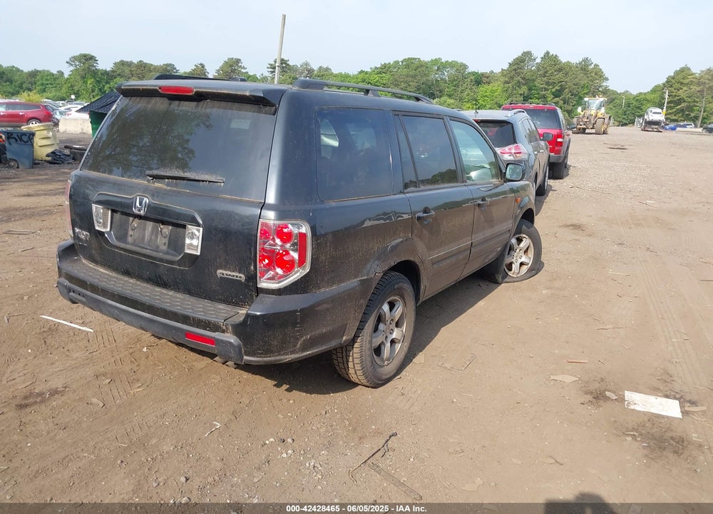 2006 HONDA PILOT EX-L VIN: 2HKYF18526H553302