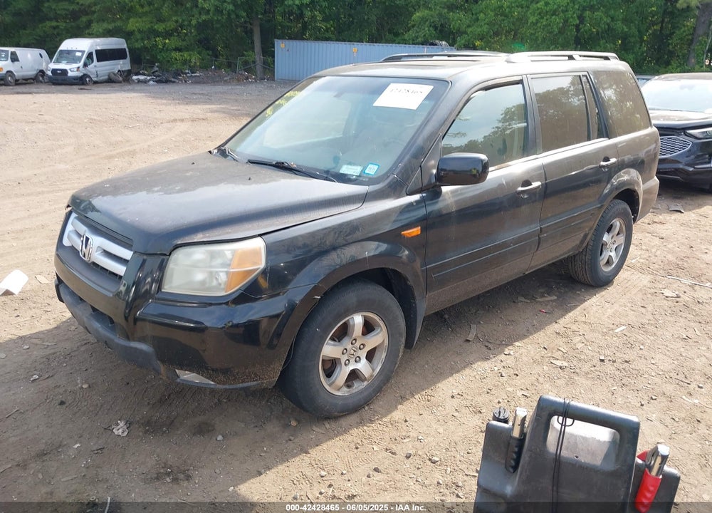 2006 HONDA PILOT EX-L VIN: 2HKYF18526H553302