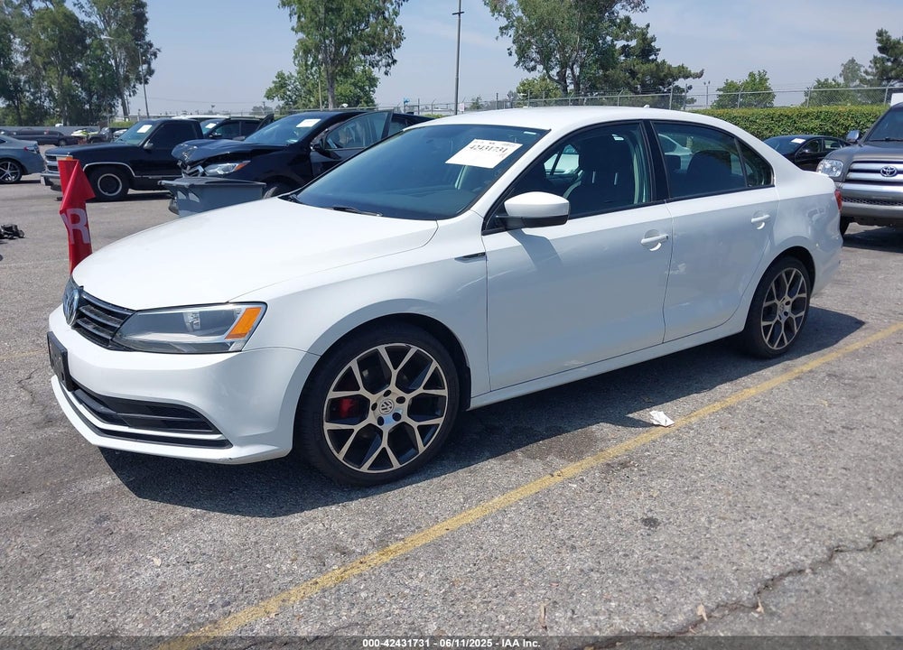2015 VOLKSWAGEN JETTA 1.8T SE VIN: 3VWD17AJ7FM356897