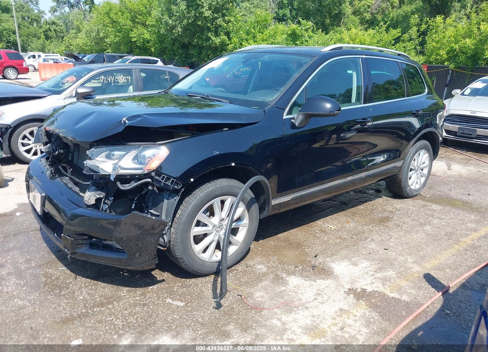 2014 VOLKSWAGEN TOUAREG VIN: WVGEF9BPXED012395
