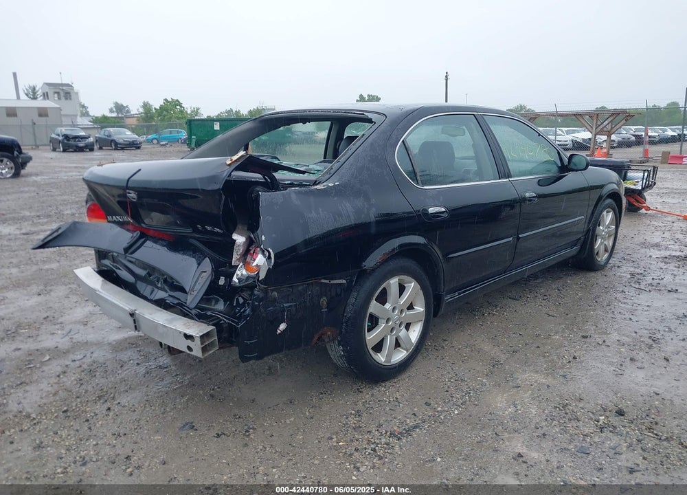 2002 NISSAN MAXIMA GLE VIN: JN1DA31A02T300083