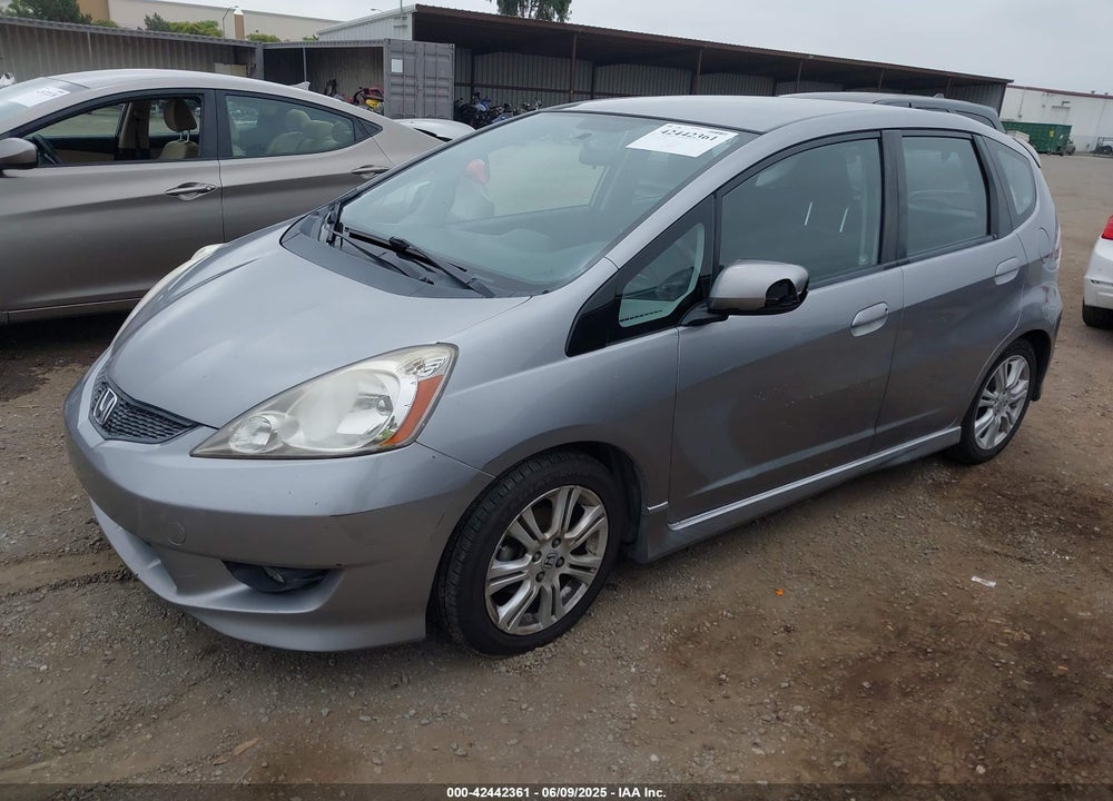 2009 HONDA FIT VIN: JHMGE88469S003295