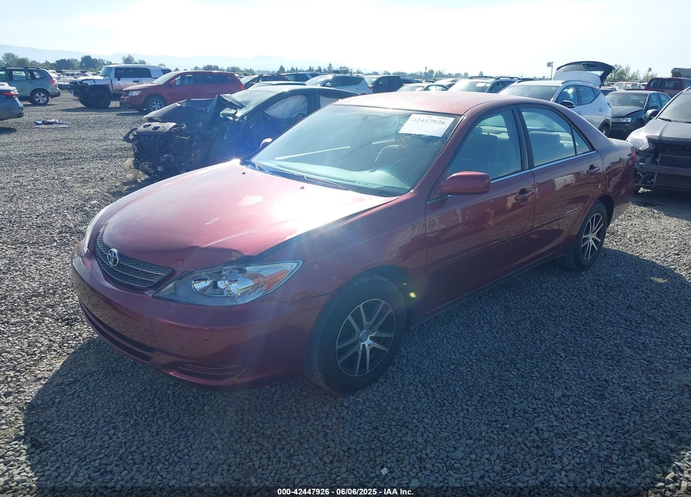 2002 TOYOTA CAMRY LE VIN: JTDBE32K520134824