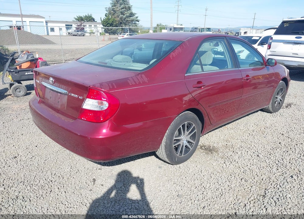 2002 TOYOTA CAMRY LE VIN: JTDBE32K520134824