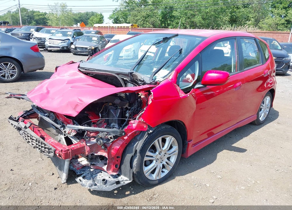 2009 HONDA FIT VIN: JHMGE88479S011678