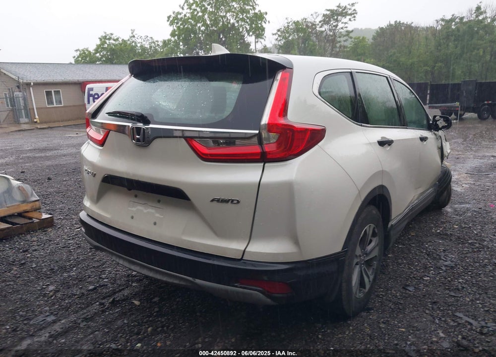 2017 HONDA CR-V LX VIN: 2HKRW6H39HH203054