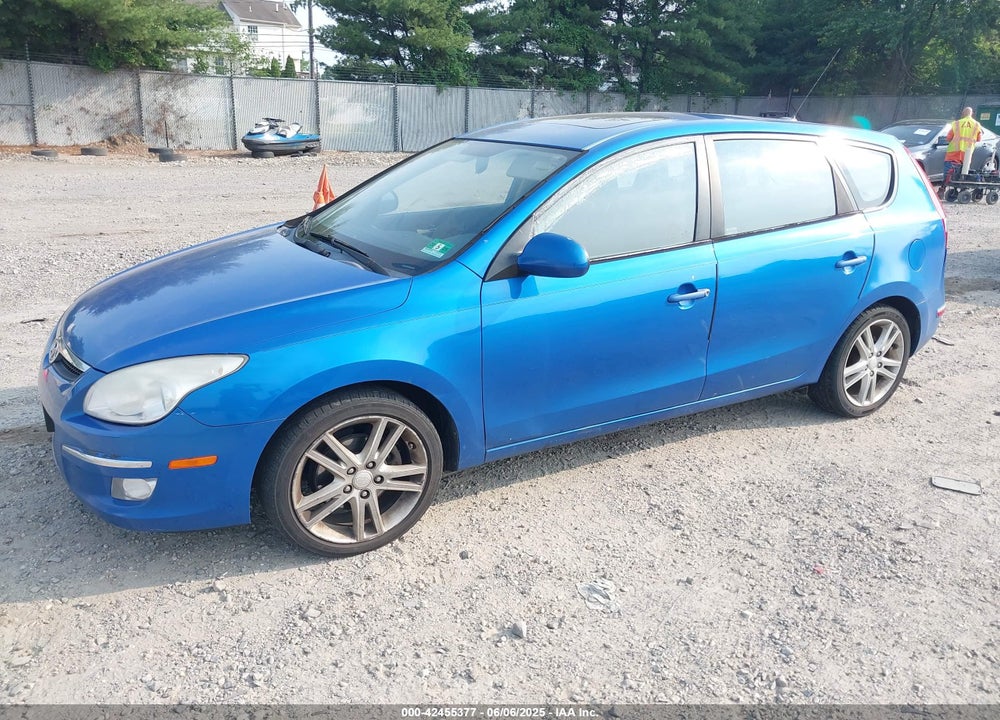 2009 HYUNDAI ELANTRA TOURING VIN: KMHDC86E29U038101