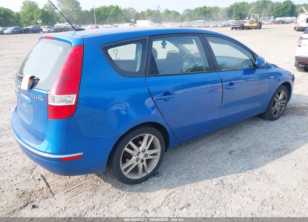 2009 HYUNDAI ELANTRA TOURING VIN: KMHDC86E29U038101