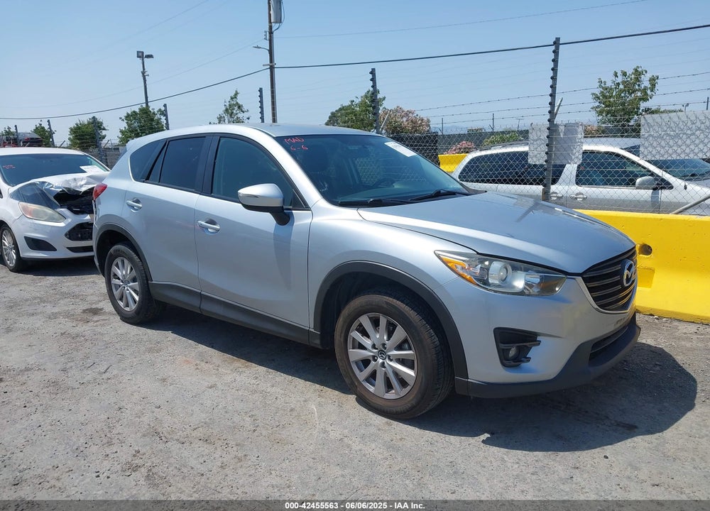 2016 MAZDA CX-5 TOURING VIN: JM3KE2CY9G0660305