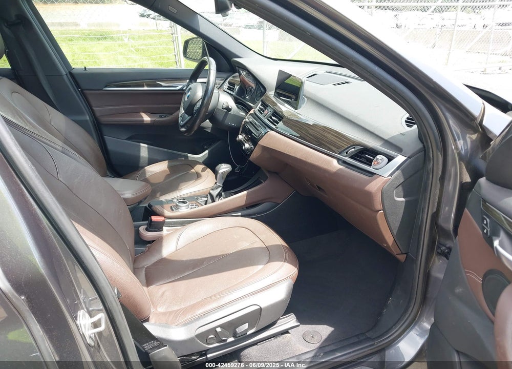 2017 BMW X1 VIN: WBXHT3Z38H4A55086