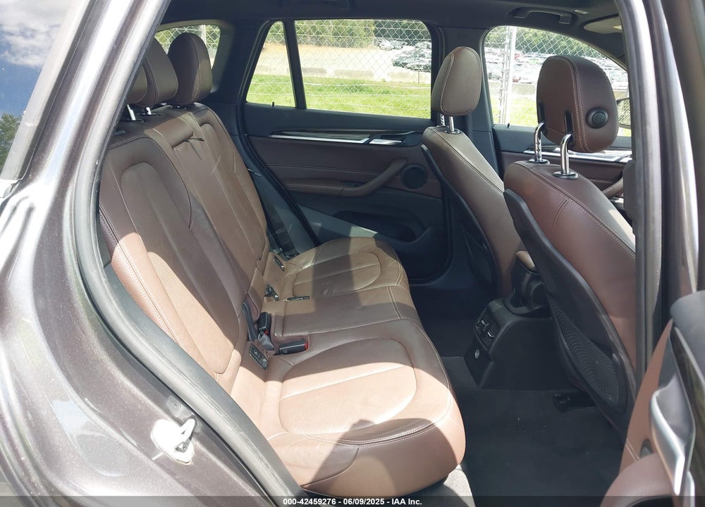 2017 BMW X1 VIN: WBXHT3Z38H4A55086