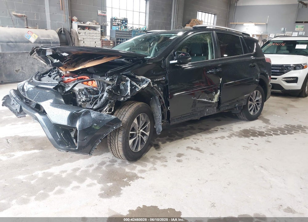 2016 TOYOTA RAV4 HYBRID VIN: JTMRJREV1GD016059